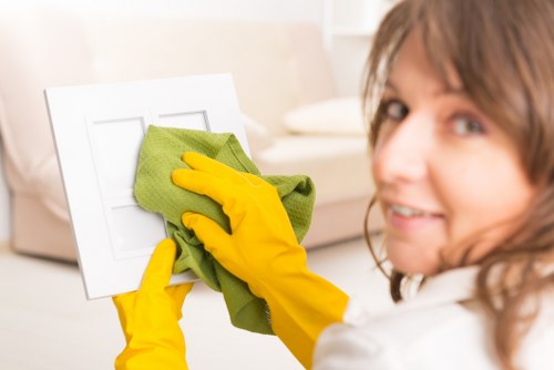 Technician cleaning a stair runner in a Belgravia property